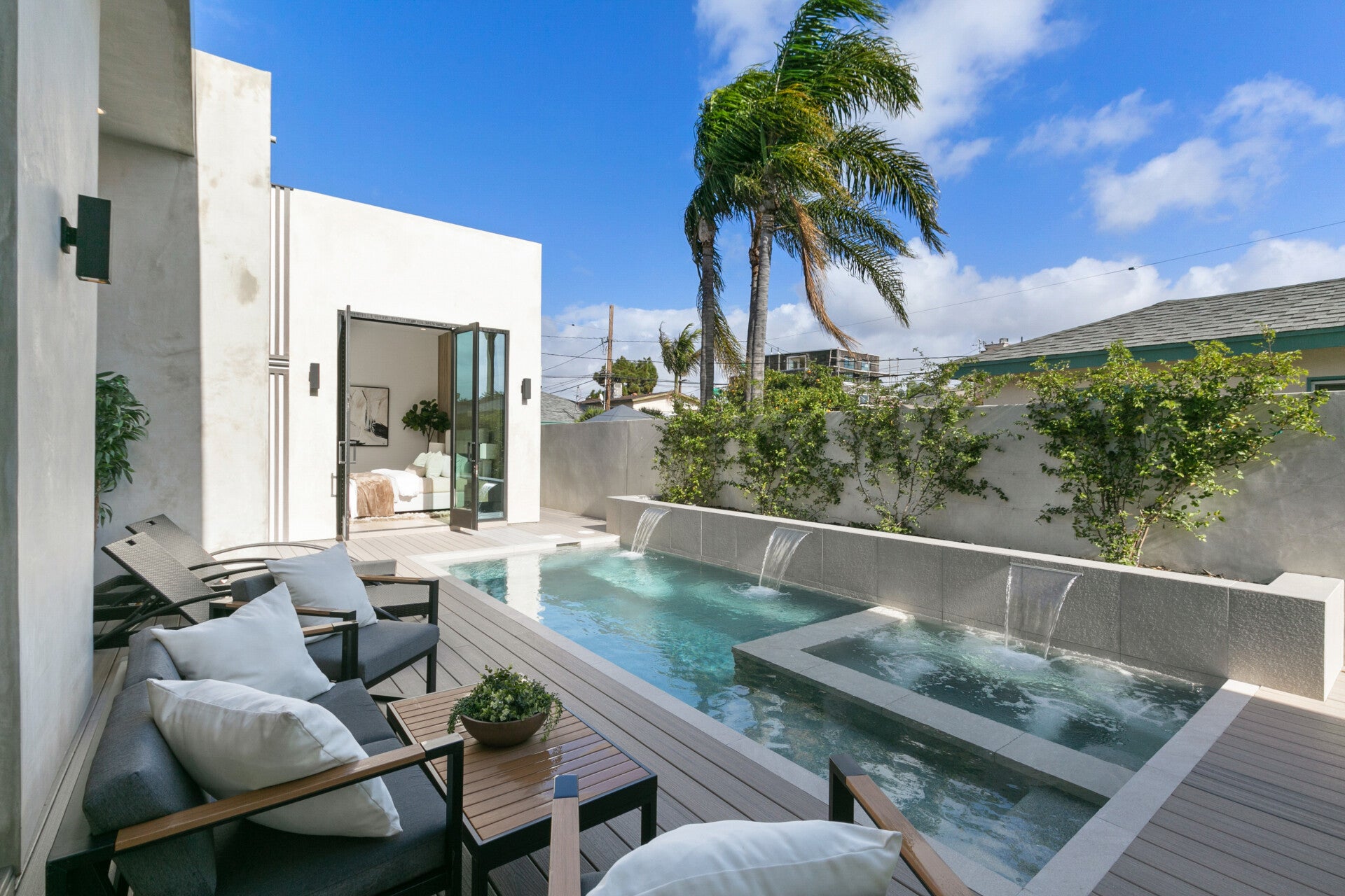 The poolside terrace at 215 Lincoln Avenue