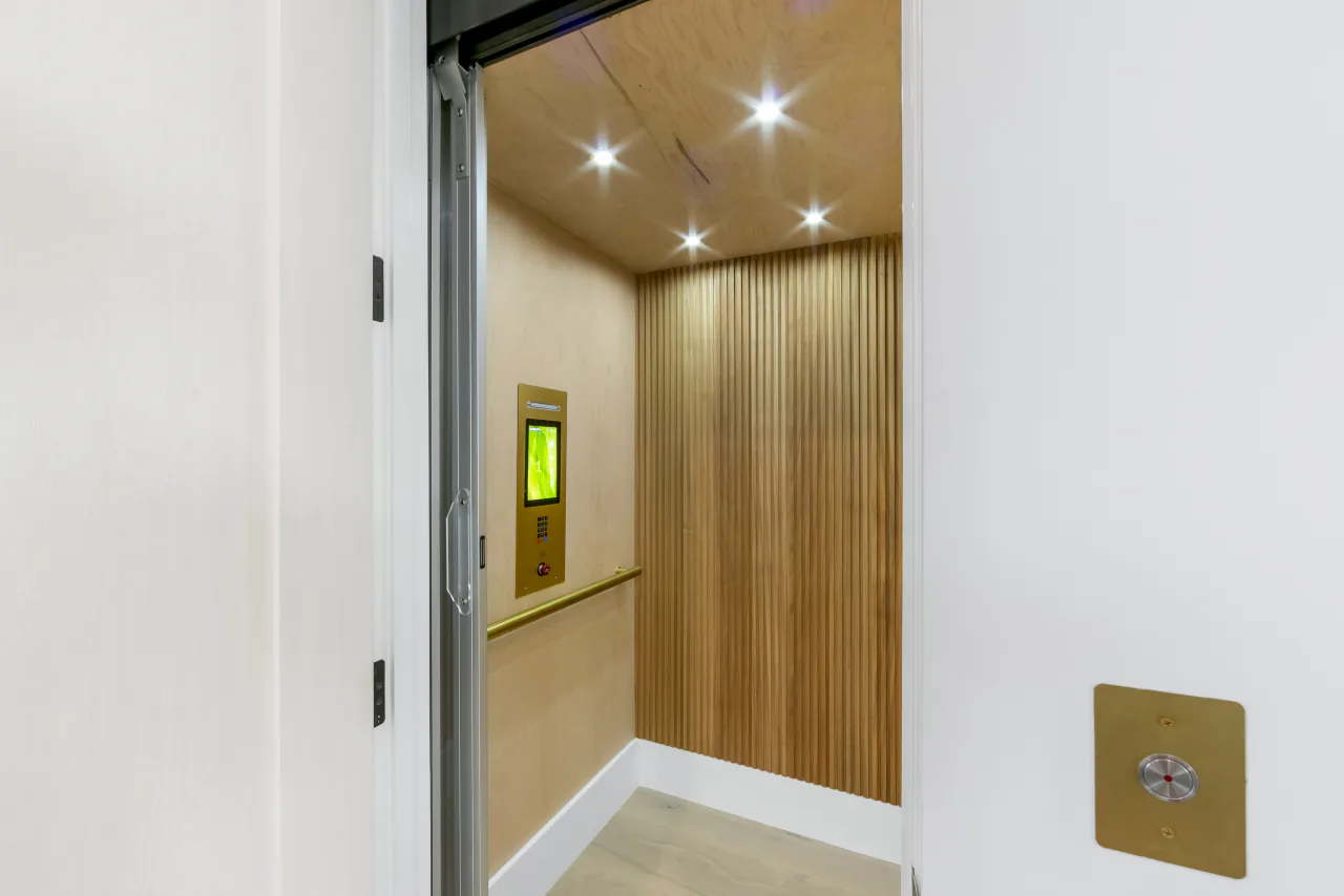 Wood-paneled elevator interior