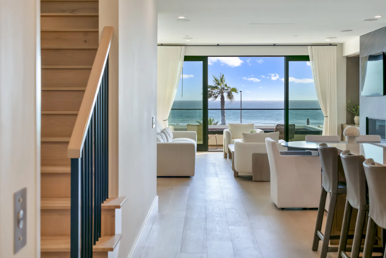 Living and dining area looking toward the Pacific