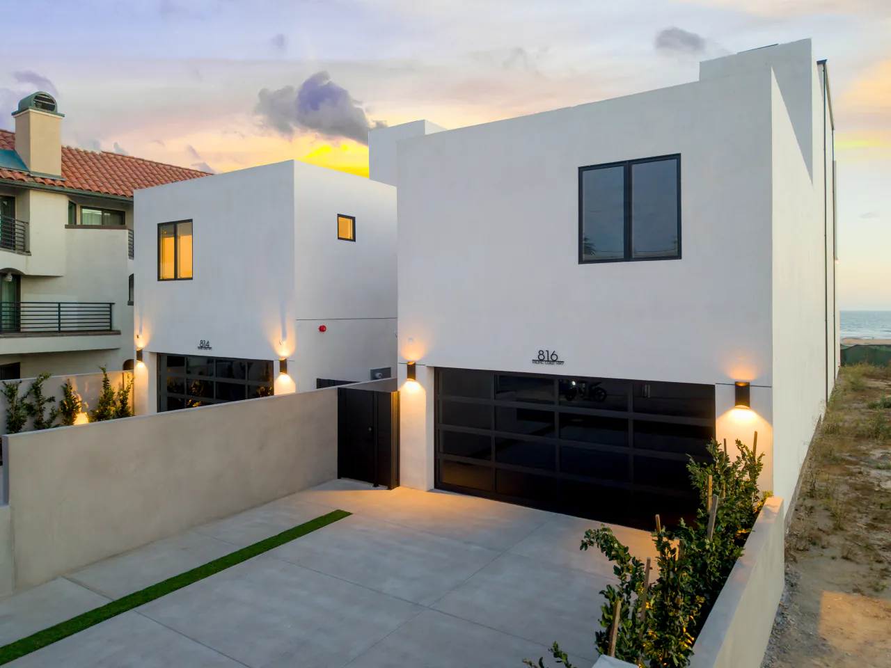 Rear exterior and garage at dusk